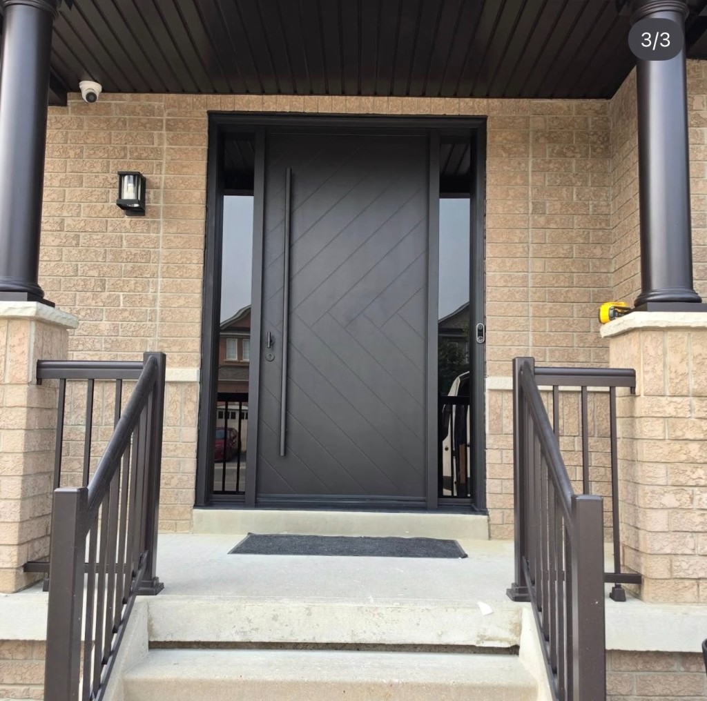 Glass porch enclosure with professionally installed double entry doors